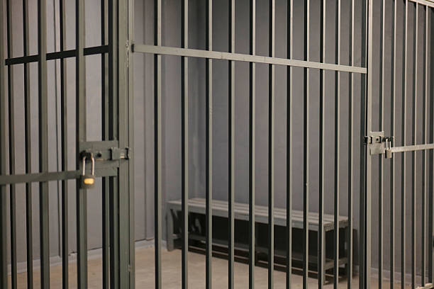 istock Police station detention room, iron bars 2209426887