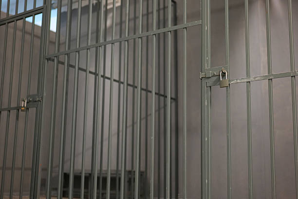 istock Police station detention room, iron bars 2209426909
