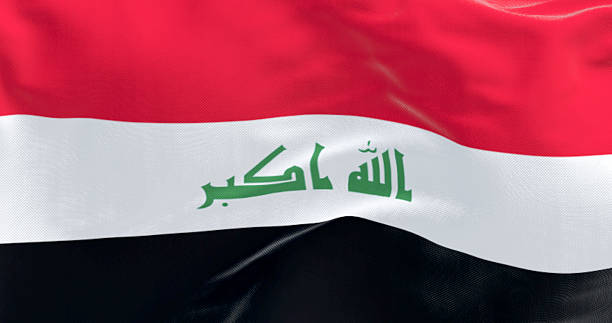 istock Flag of Iraq with Arabic calligraphy waving in wind, 3D render 2209427038