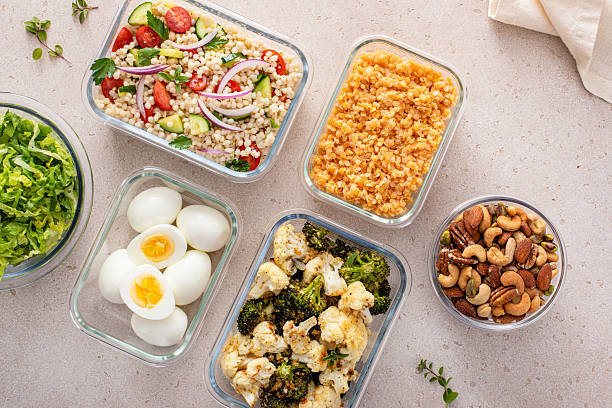 istock Vegetarian meal prep with eggs, lentils, roasted vegetables, nuts and salad 2209429785