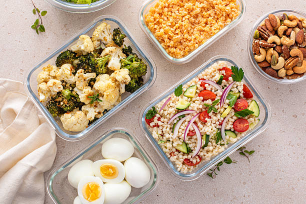 istock Vegetarian meal prep with eggs, lentils, roasted vegetables, nuts and salad 2209429789