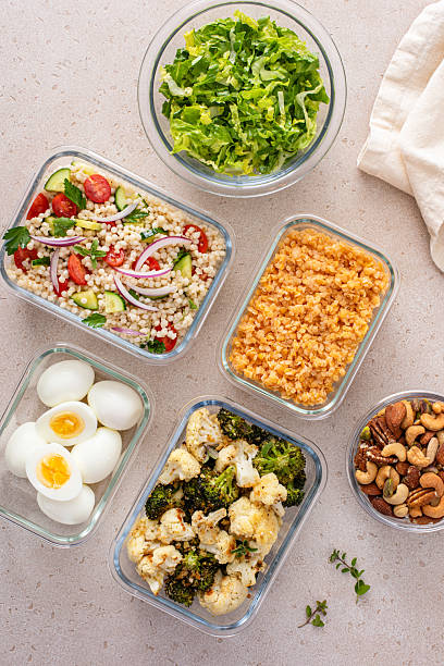istock Vegetarian meal prep with eggs, lentils, roasted vegetables, nuts and salad 2209429791