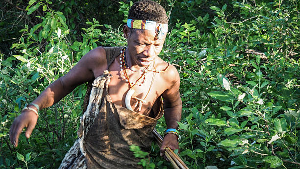 Tanzania, February 25th, A man from Hadzabe tribe seen during morning hunt. The Hadzabe are considered one of the last remaining hunter-gatherer tribes in the world.