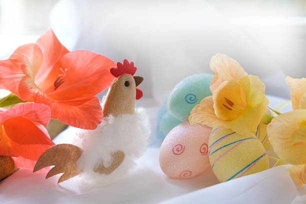 Easter colorful eggs  in basket, chick, spring willow tree and pastel bokeh background Easter Card with copy space. Farmhouse, Happy Easter