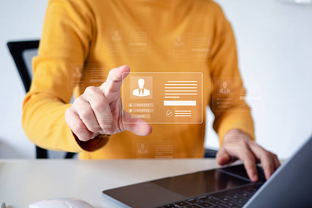 istock Digital identification or digital ID concept. Businesswoman use laptop and hand touch virtual screen of digital identification card to accessing databases by digital identity for cyber security. 2209454136