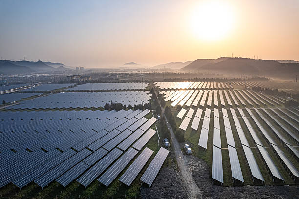 istock aerial view solar power station during sunset 2209458829