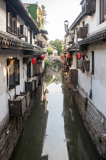 istock Waterway Through Nanxiang Ancient Town with bridges 2209464863