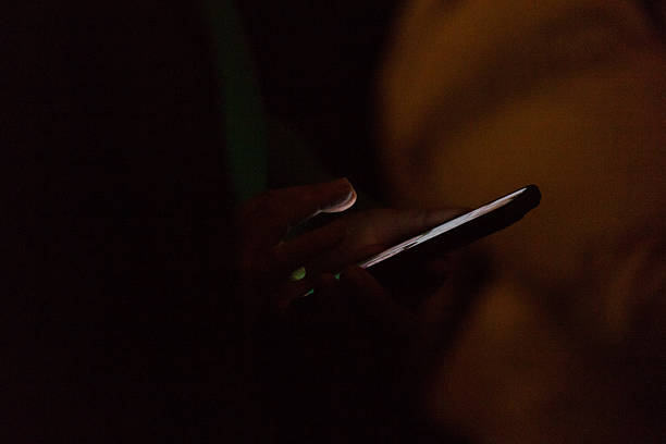 istock Closeup smartphone being used outdoors at night. Innovation in communication 2209473015