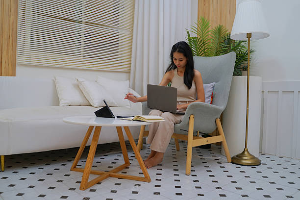 istock A woman working with digital device at home. 2209473241