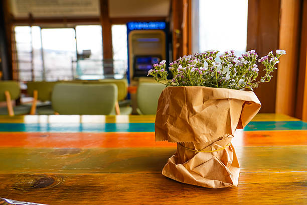 wild flowers in a small pot on the table. High quality photo