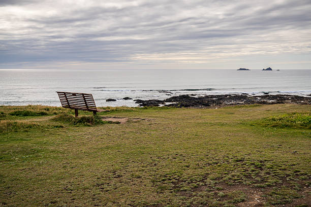 An old rusty bench in Treyarnon Bay, Cornwall, England, UK