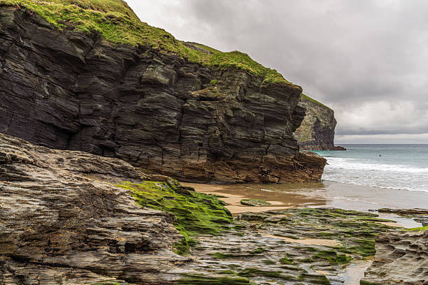 istock Clouds over the sea and cliffs of Trebarwith Beach, Cornwall, England, UK 2209484609