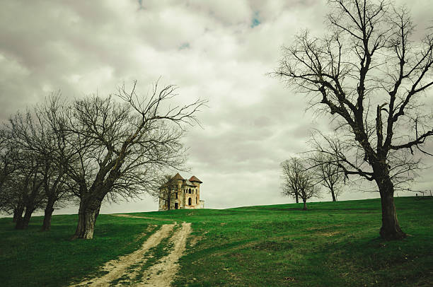 Abandonded mill in the middle of agricultural fields in rural L'Empordà, Figueres, Girona, Catalonia, Spain.