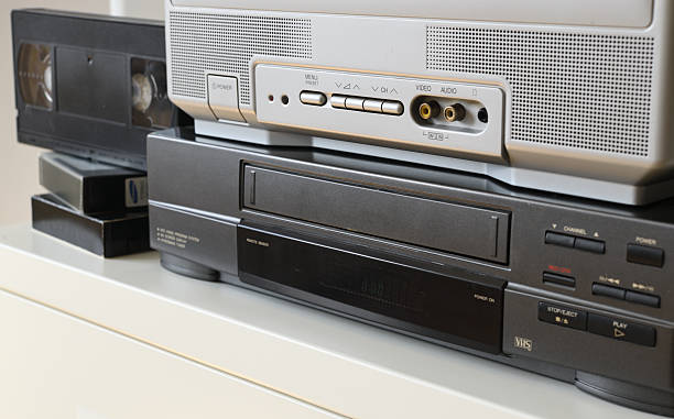 istock An old TV with a VCR on the table.90s. 2209486191