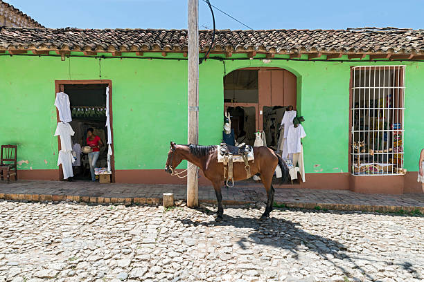 Horseback riding in the tropical valley of Vinales, Cuba