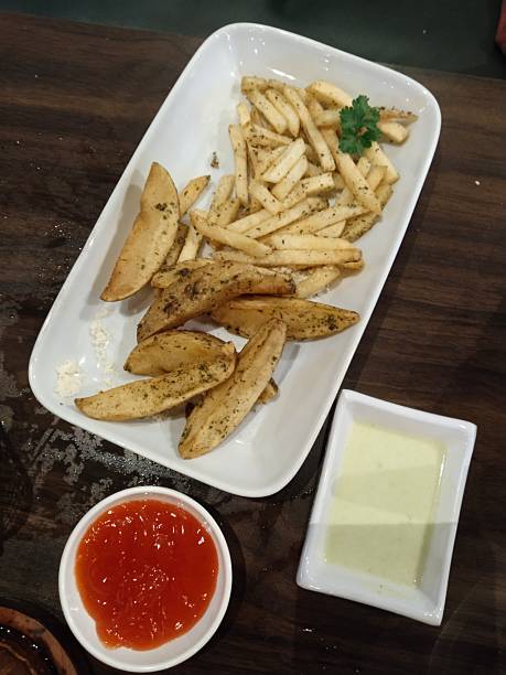 istock French fries or potato wedges, both are made from potatoes 2209486861