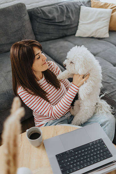 istock Teacher grades student work during coffee time at home 2209487951