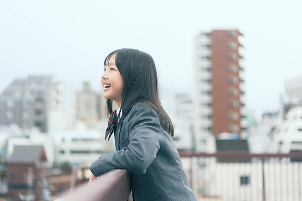 istock Japanese female junior high school students in uniform 2209488121
