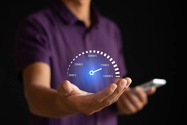 istock Smartphone speed test held in hand and virtual screen of internet speed measurement. Internet and technology concept. High speed internet concept. 2209489887