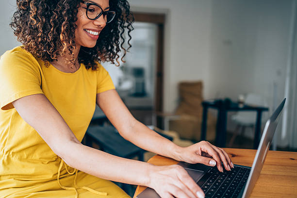 istock Successful businesswoman in modern office working on laptop. 2209492440