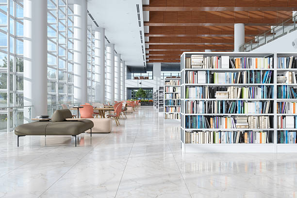 Modern Library Interior With Bookshelves, Tables, Chairs And Seats