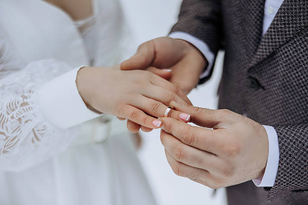 istock A man and woman are getting married 2209494528