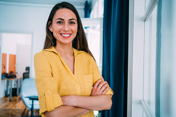 istock Confident businesswoman in modern office. 2209494634