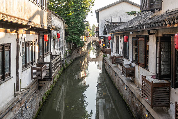 istock Waterway Through Nanxiang Ancient Town with bridges 2209506950