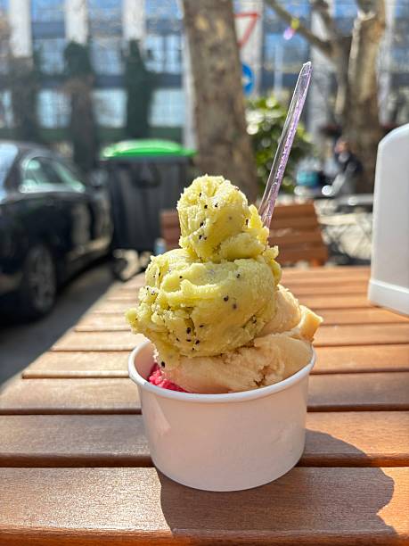 istock Soft serve ice cream in a white cup 2209515034