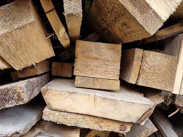 istock A pile of old logs and beams 2209517255