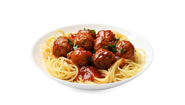 istock Delicious pasta with meatballs isolated on white 2209523851
