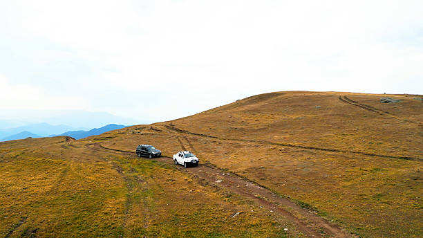 Winding their way along dusty trails that snake around towering peaks, these vehicles utilize their powerful engines and all-wheel drive capabilities to grip the terrain as they progress. These adventure enthusiasts opt for mountain journeys to explore the beauty of nature and take on challenging conditions.