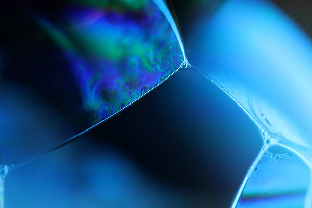 istock Blue surreal shapes on dark background 2209525409