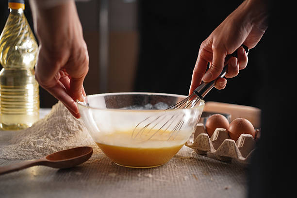 istock Female baker preparing homemade bread dough 2209530822