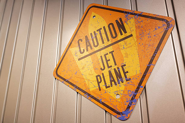 A warning sticker on an old war plane