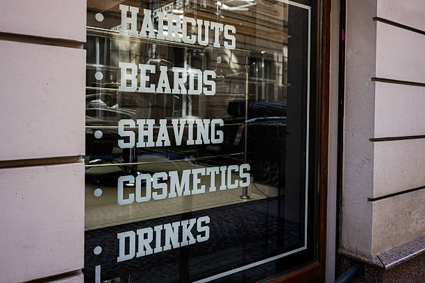 istock Barber shop window display showcasing services like haircuts, cosmetics, and drinks 2209532965