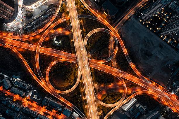 istock Aerial city highway interchange at night. 2209537534
