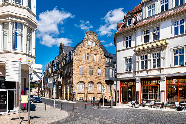 istock Historic town scape in Gotha, Thuringia, with sandstone building and charming cafes under blue summer skies 2209539929