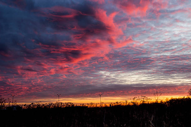 istock The devil's clouds. morning in hell. sunset in hell. red clouds.  heaven, sky 2209540392
