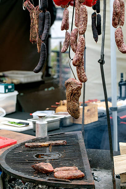 istock Traditional Sausages Hanging Over Grill 2209549308