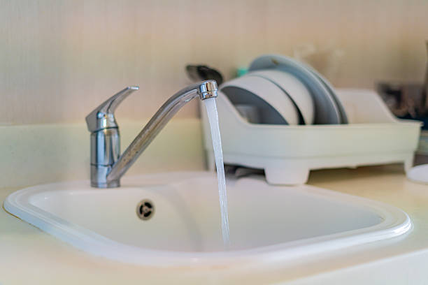 istock Water faucet and Modern sink in the kitchen 2209549466