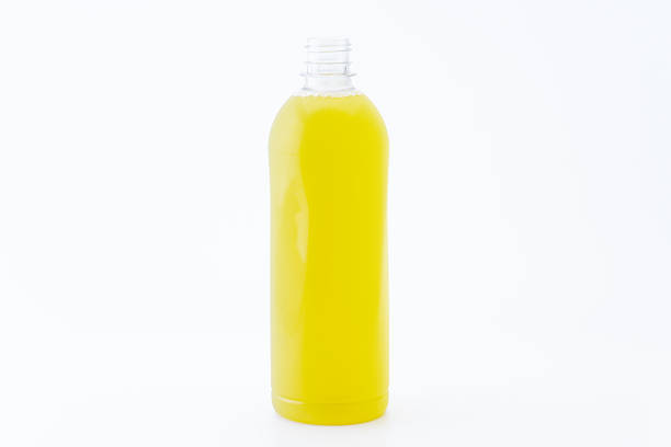 Green tea in a plastic bottle against a white background