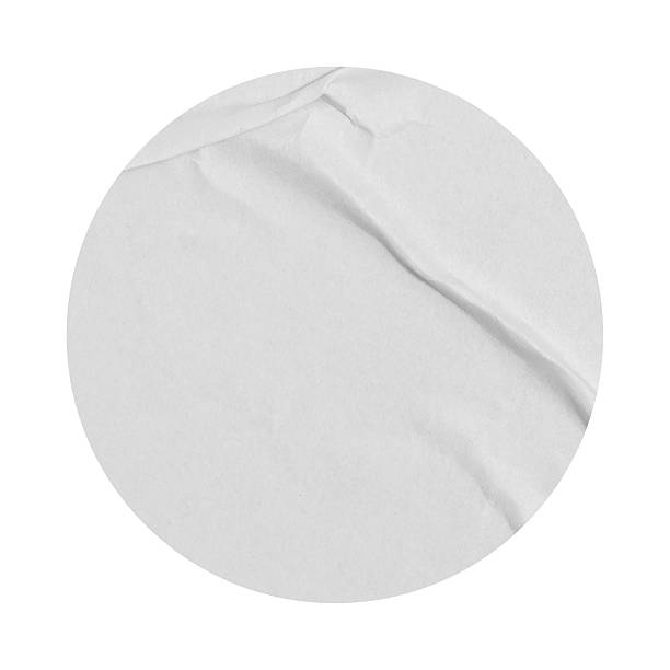 istock Blank White shape round crumpled paper circle promotion sticker label cutout isolated on a transparent background 2209560581
