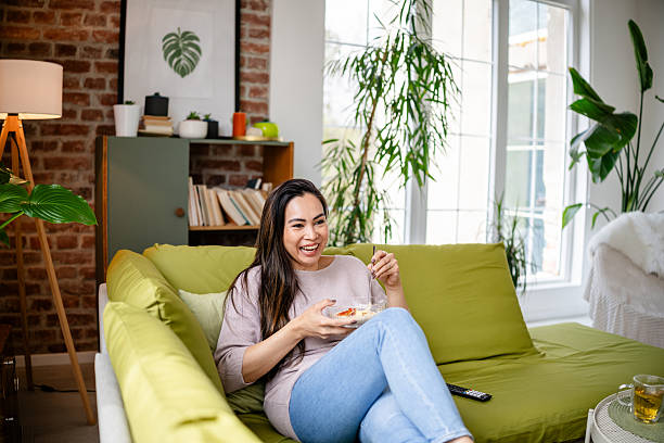 istock Relaxing evening at home for a teacher enjoying leisure time with snacks 2209562323