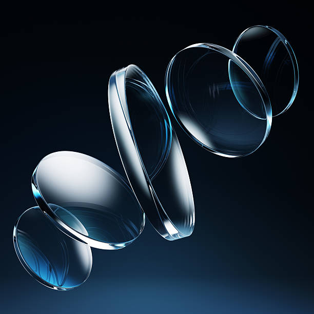 istock 3d crystal glass disks on dark blue background. Transparent circle plates, flying discs with flare and prism light refraction on abstract black neon bg. Render round geometric shapes 2209562811