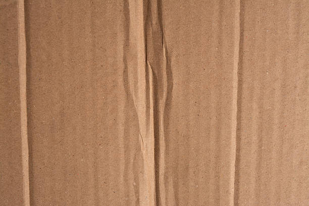 istock Beige cardboard texture. Crumpled cardboard. Copy space. 2209568990