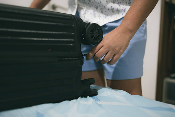 istock Packing the suitcase with anticipation for the journey 2209570659