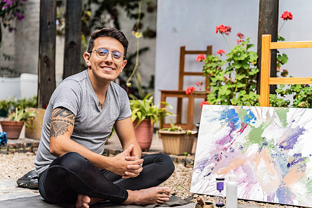 Portrait of a young man during art class