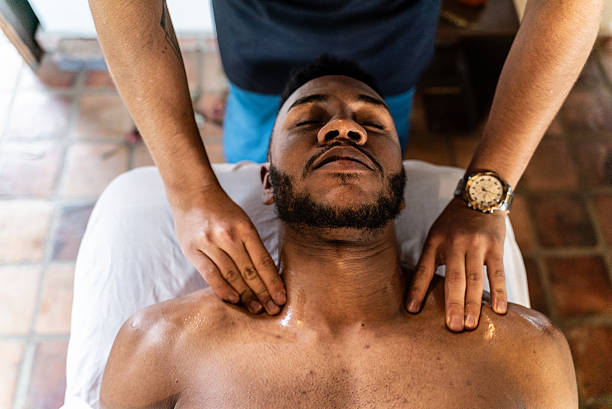 Young man receiving massage at a spa