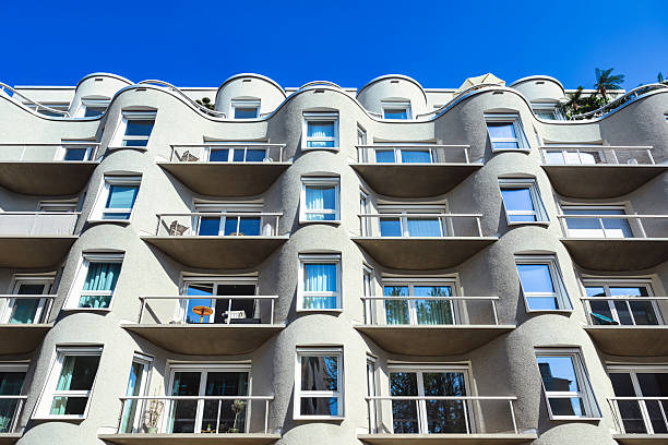 modern curved residential architecture in central berlin under blue sky